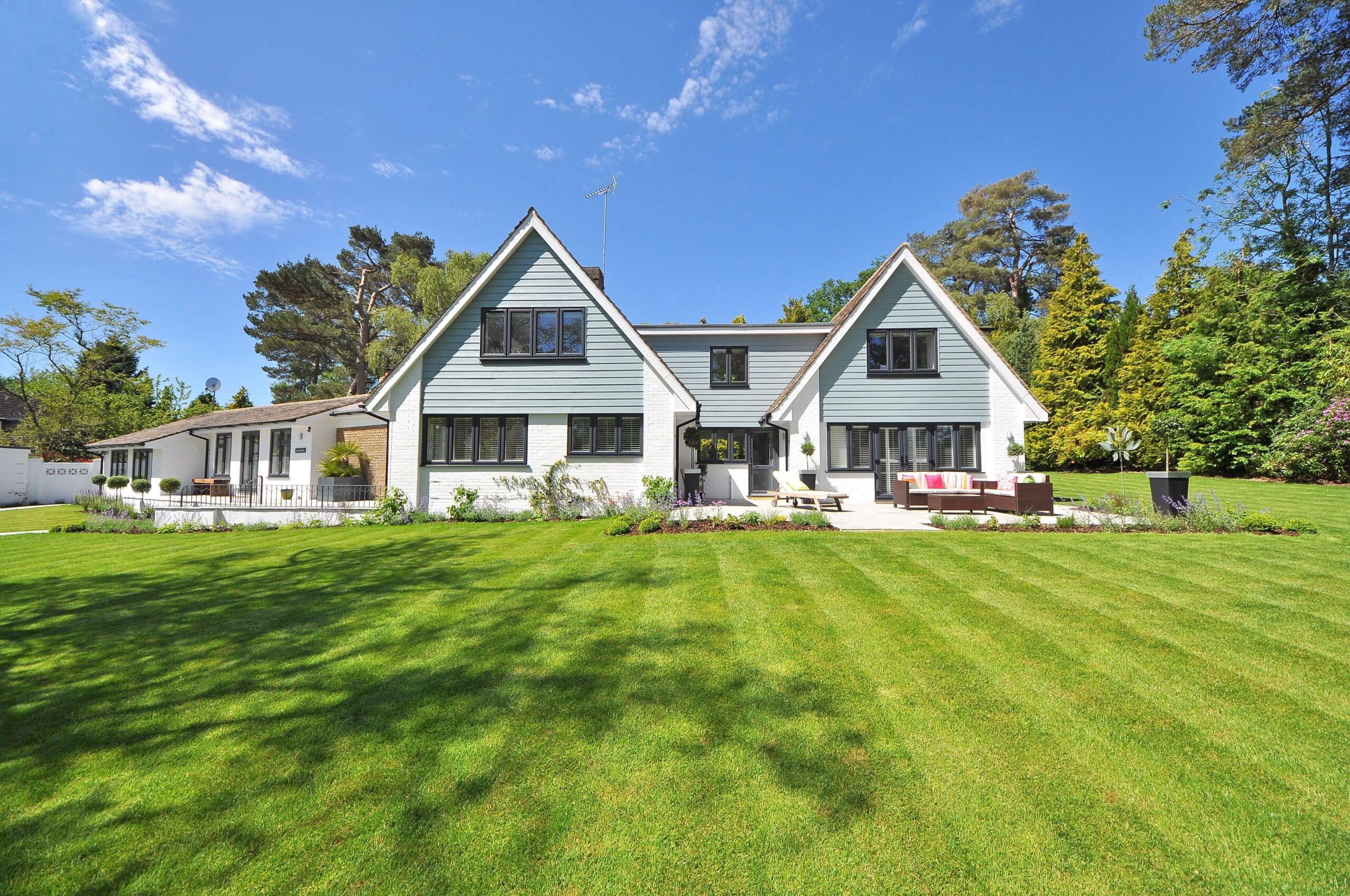 beautiful house with green grass and trees, beautiful landscape design