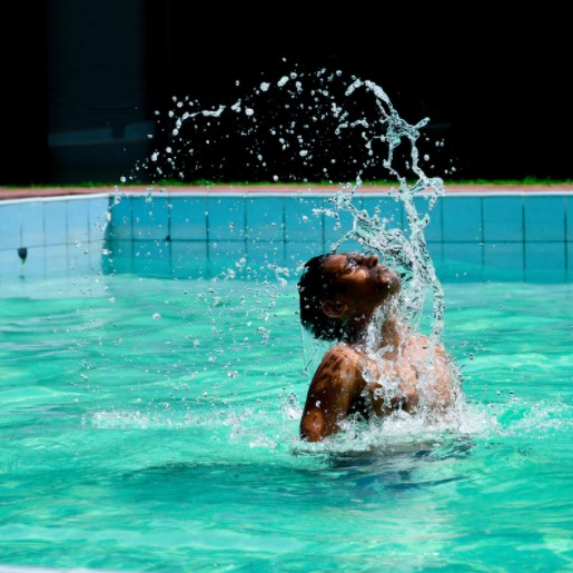 Man with water splashing